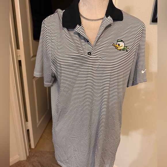 MENS OREGON DUCKS BLACK ANTIGUA SKILLS SHORT SLEEVE POLO SHIRT - Picture 1 of 5